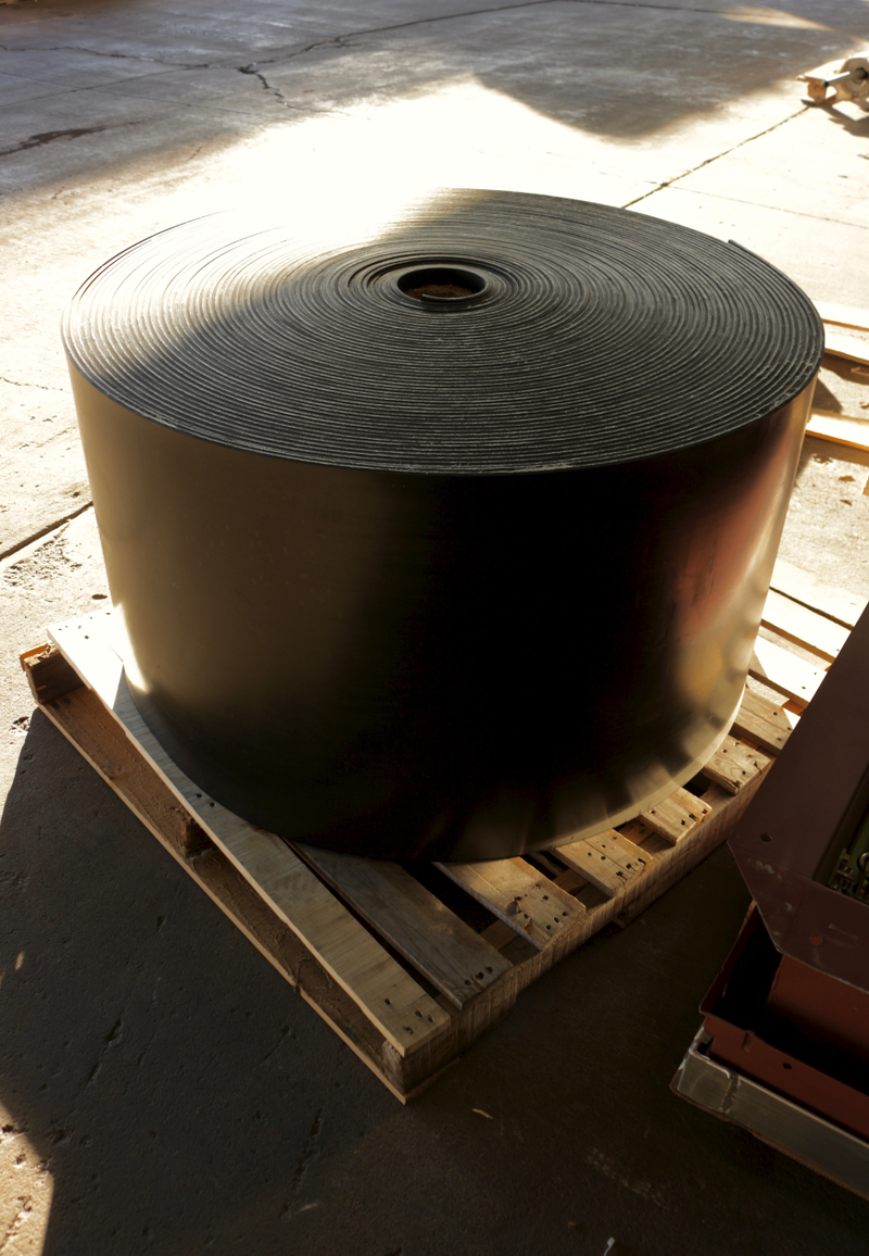 A 327' roll of conveyor belt, waiting.
